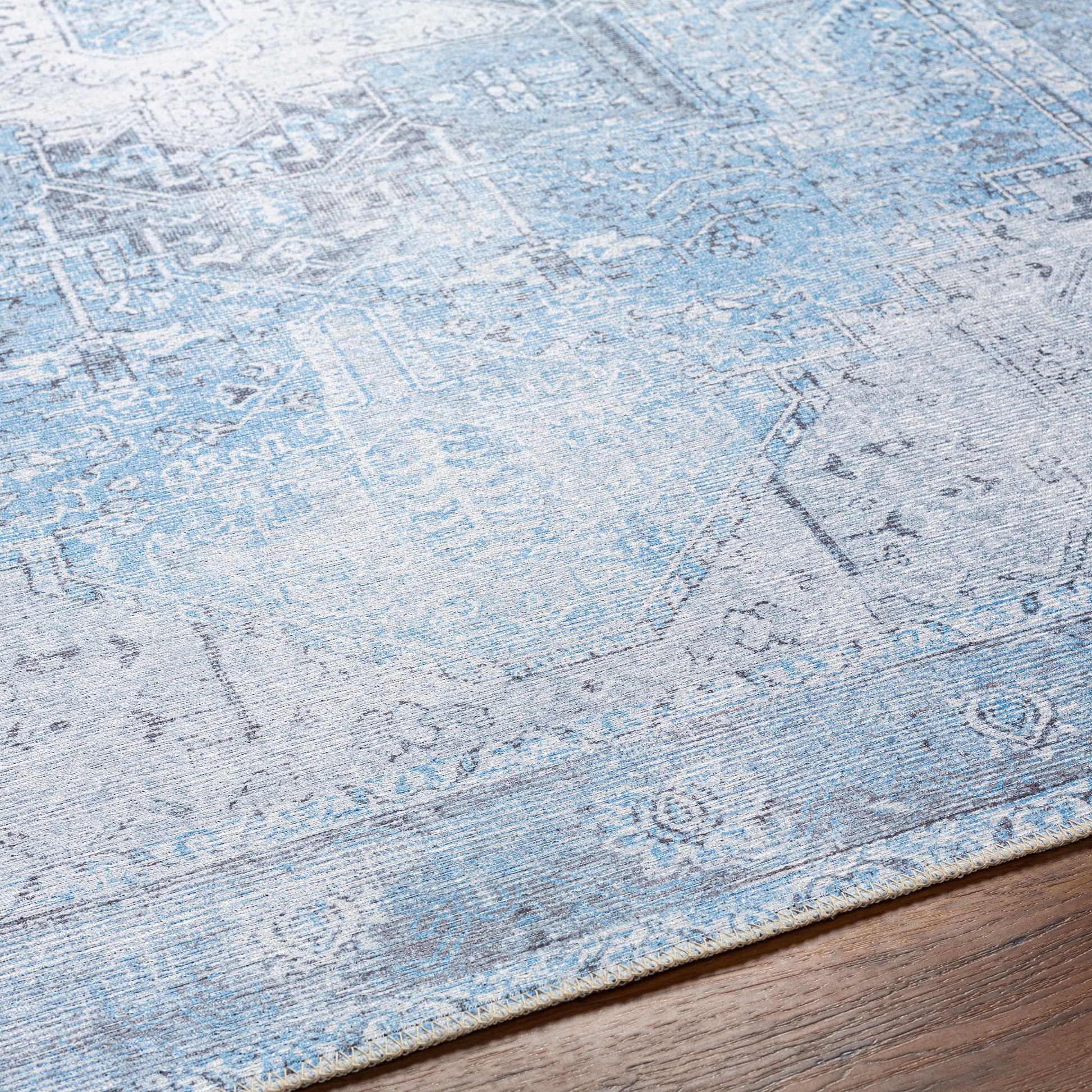 Aqua Rosman Washable Area Rug.