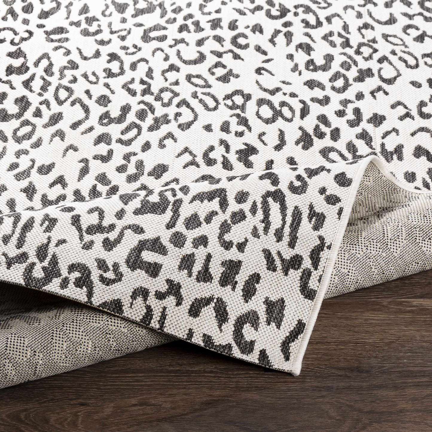 Alderbury White Leopard Print Rug.