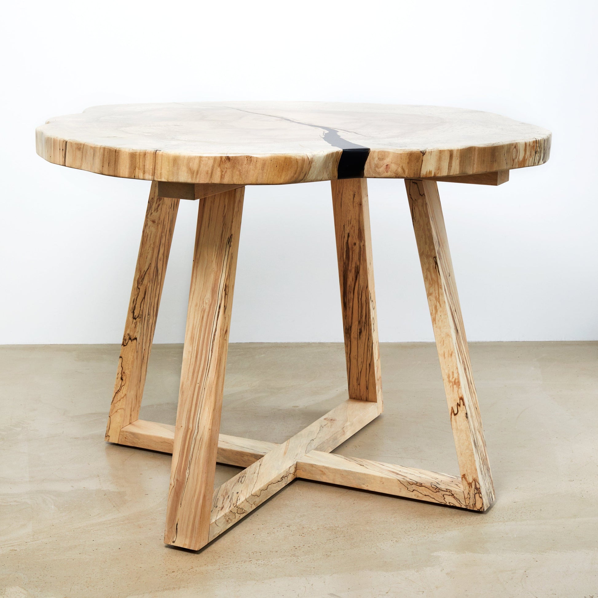 https://www.thecarpentryshopco.com/cdn/shop/products/crosscut-slab-round-dining-table-37972821147874.jpg?v=1661280953&width=1946